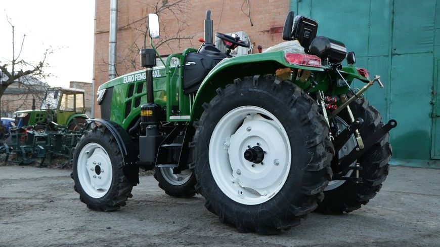 Мінітрактор EUROFENG 554 XL з реверсом, два циліндра на 1000 кг, вага 2000 кг , широка резина , 2х дискове зчеплення 1998 фото